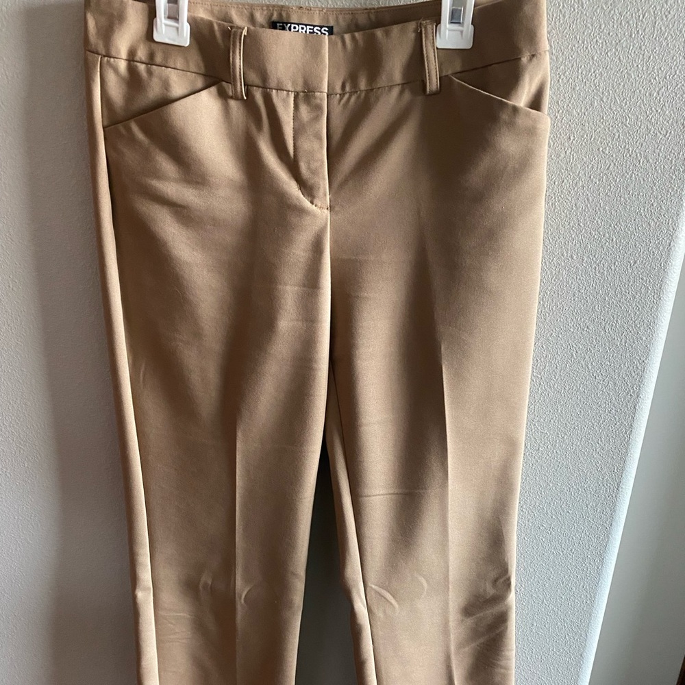 Express 00 tan work pants. But they fit big